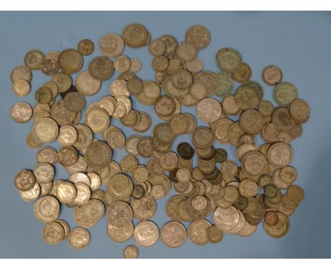 A collection of British 1920-1946 silver coinage, including florins (x54), shillings (x63), sixpences (x72) and threepences (