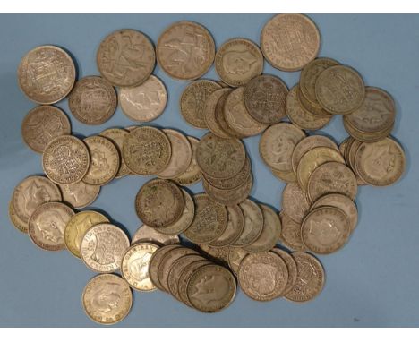 A collection of sixty-four 1920-1946 silver half-crowns and four crowns: 1935 (x2), 1937 (x2), 1007g.