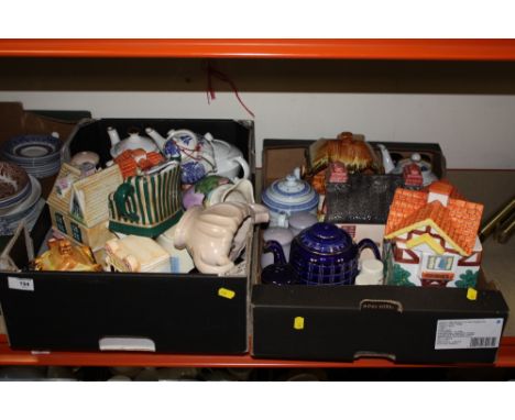 TWO TRAYS OF NOVELTY CERAMIC TEAPOTS ETC. 