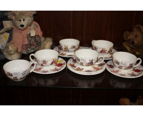 A SET OF SIX ROY KIRKHAM 'MY FAVOURITE TEDDIES' CERAMIC CUPS AND SAUCERS 