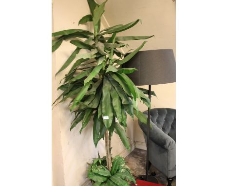 A FAUX TREE IN CERAMIC PLANT POT  