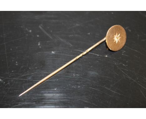 A DIAMOND SET 15CT STICK PIN