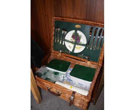 A WICKER PICNIC HAMPER AND CONTENTS