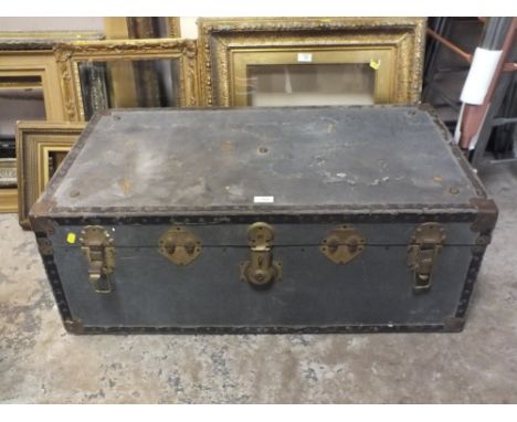 A VINTAGE RECTANGULAR PACKING TRUNK