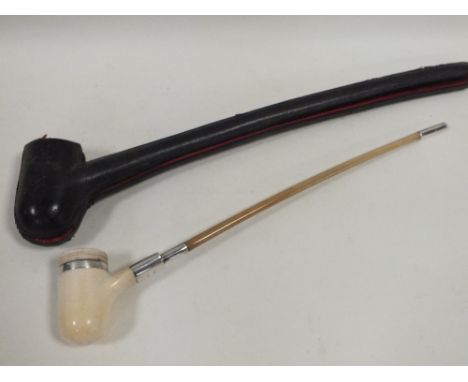A LONG STEMMED ANTIQUE PIPE DATED 1896 IN ORIGINAL FITTED LEATHER CASE   