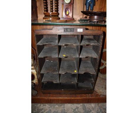 A VINTAGE WOODEN SET OF RAILWAY INTEREST PIGEON HOLES MARKED LMS
