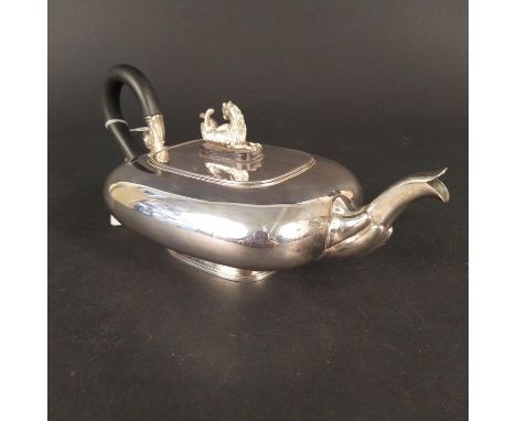 A Dutch silver teapot on flared rim base, wooden handle and unusual hippocamp finial to lid, marked to base Bonebakker En Zoo