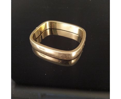 A hollow 18ct gold plain bangle, approx 35g
