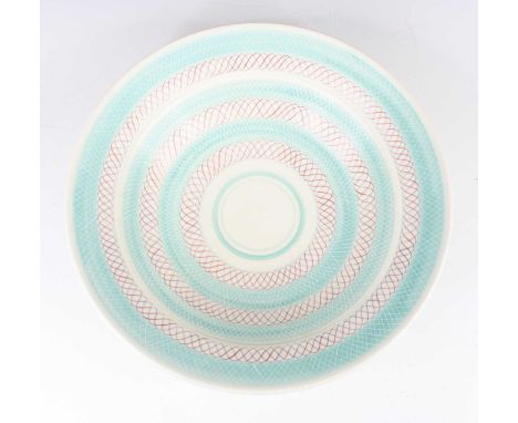 A Poole Pottery 'Freeform' footed table bowl, of typical dished tapering form, stylised interlaced banded decoration to inter