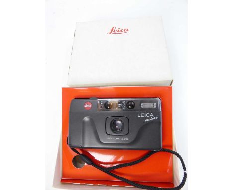 A Leica Mini automatic super compact camera, with Leica Elmar f-3.5 35mm lens, boxed with instructions and in card outer box 