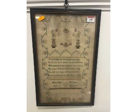 A George III needlework sampler with embroidered alphabet and numerals above birds and baskets of flowers with poem below, al
