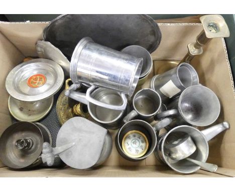 A box of miscellaneous metalware, to include pewter tankards, brass candlestick, brass chamberstick, shell case candlestick e