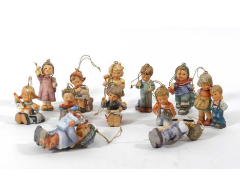 A collection of twelve Hummel Christmas tree decorationsNo damage or restoration.