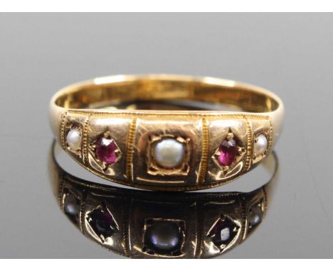 A vintage 18ct gold ruby and seed pearl set half-hoop ring, size N, 1.6gSlightly misshapen and with wear consistent with age.