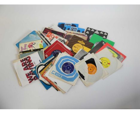 A collection of 7" LPs, to include Rolling Stones Miss You, Buddy Holly Raining in my Heart, and Rolling Stones Angie 