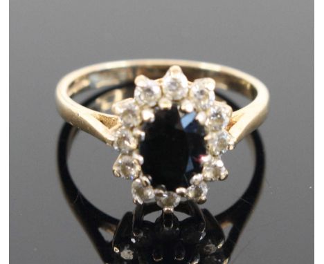A Victorian style 9ct gold sapphire and white stone set flower head cluster ring, size K, 2g
