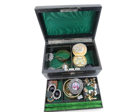 A leather-clad jewellery box and contents to include a pair of gent's engine turned silver cufflinks, gilt metal cufflinks, y