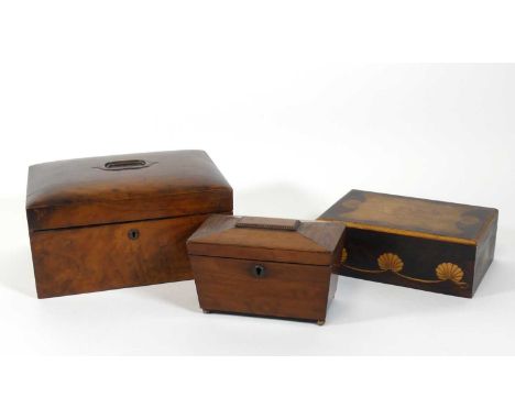 A Victorian walnut jewellery box, the hinged lid surmounted by carrying handle, opening to reveal a fitted interior, width 30