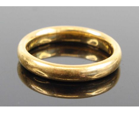 A 22ct gold court shaped wedding band, sponsor HS, size K, 5g
