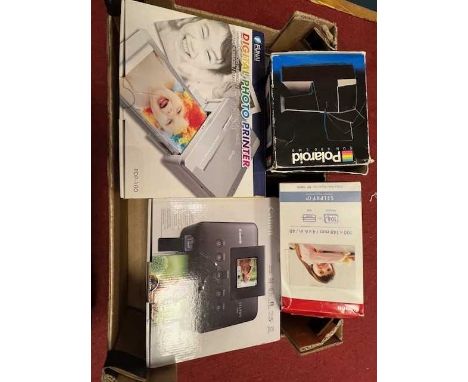 A collection of photography equipment, to include a Canon Selphy CP800 compact photo-printer