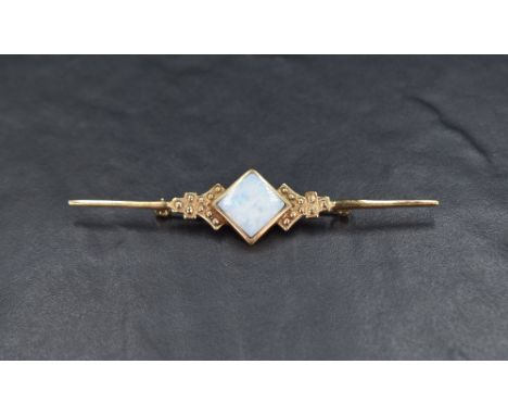 A 9ct gold bar brooch having a central square opal doublet, approx 83mm long &amp; 7.3g