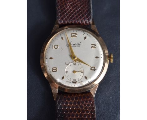 A vintage nine carat gold cased Accurist wristwatch, the champagne dial with alternating Arabic numerals and lozenge batons w