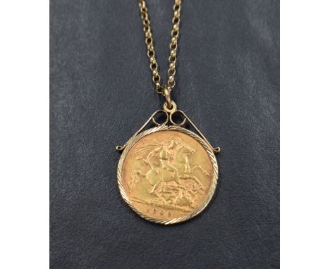 A gold half sovereign dated 1909 in a 9ct gold removable decorative pendant mount on a 9ct gold belcher chain, 20' &amp; 7.3g