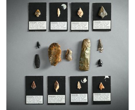 ANTIQUITIES TO INCLUDE:  A quantity of flint arrowheads, set on card display bases with printed text, panels 10 by 6.5cm  An 