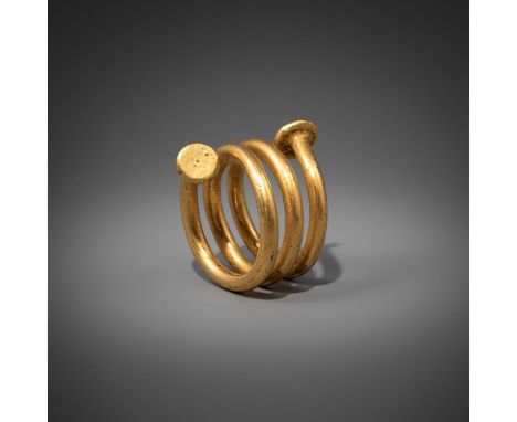 A GOLD RING/HAIR COIL  BELIEVED TO BE LATE ROMAN/EARLY CELTIC?  Size: ring size approximately F Gross weight 7.1 grams  Prove