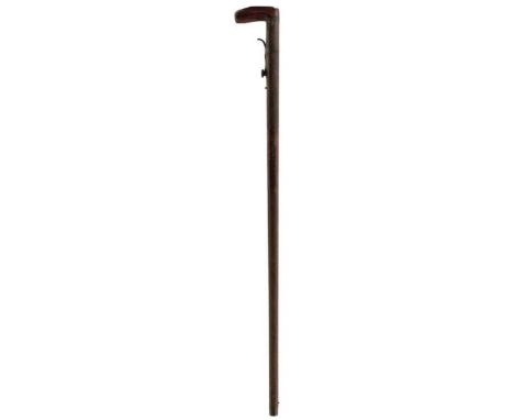 A 16-BORE PERCUSSION WALKING STICK SHOTGUN, 28.5inch sighted barrel, underhammer action, exposed trigger, wooden grip, cut fo