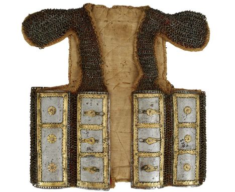 A RARE 17TH CENTURY INDIAN MAIL AND PLATE ARMOUR, the cloth backed jerkin form body with nine chest, side and back plates of 