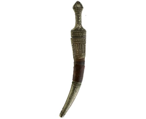 A 19TH CENTURY SILVER MOUNTED ARAB JAMBIYA OR DAGGER, 31cm tapering double edged blade with a chiselled rib, characteristic h