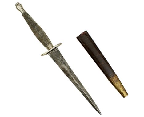 A FIRST PATTERN FAIRBAIRN-SYKES COMMANDO KNIFE OR DAGGER, 17cm flattened diamond section blade etched with the F-S and Wilkin