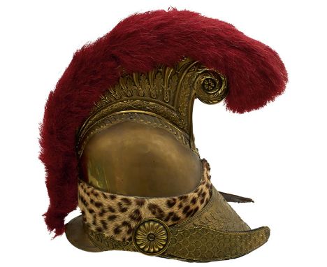 A COMPOSITE SECOND EMPIRE SAPEURS POMPIERS HELMET, the brass skull large oak leaf embossed peak, centred crossed axes and hos