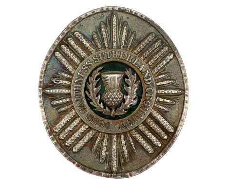 A SCARCE HIGHLAND MILITIA RIFLES OFFICER'S SILVER POUCH BELT PLATE, the oval plate with rippled border, central garter title 