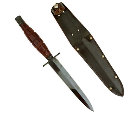 A US POST WAR FIGHTING KNIFE, 15.25cm flattened diamond section blade, characteristic hilt with compressed leather washer gri