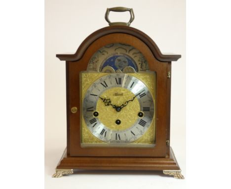 A Franz Hermie Debden bracket mantle clock, mahogany arched case, manual wind German movement with Westminster chime and moon