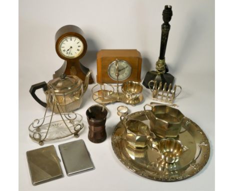 A 1930s three piece elecroplated tea service together with other plated wares, a French inlaid mantle clock, pair of cased bi