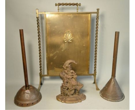 An early cast iron door stop of Mr Punch 31cm tall, together with copper ponsh's, brass planter, fire screen, hanging oil lam