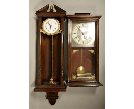 Thwaites &amp; Reed, Clerkenwell, London, a mahogany wall clock, the dial encrusted with gilt metal foliage decoration, 72cm,