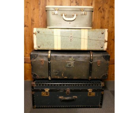 Mid Century shipping/traveling cases together with an early wood &amp; brass bound sailor's trunk. (4) 