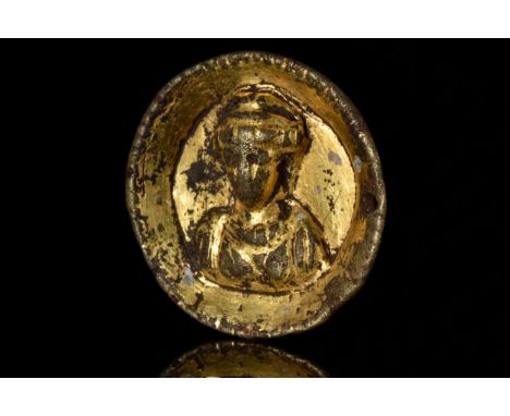 Ca. 100-300 ADAn ancient Roman gilded silver discoid phalera military decoration with raised rim surrounding a gilded appliqu