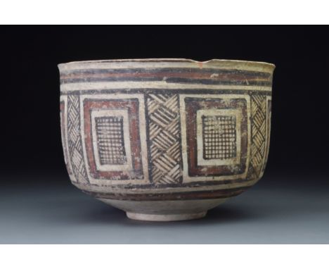 Balochistan Nal. Ca. 2300 BCA beautifully painted pottery cup with a circular foot, a broad base, tall walls, and a slightly 