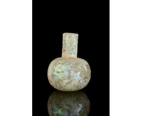 Ca. 100-300 ADA glass flask featuring an apple-shaped lower body leading to a narrow neck with a straight rim. This beautiful