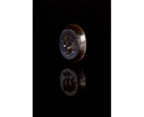 Ca. 200-300 ADA beautiful onyx intaglio of an ovoid form with a flat verso and a bevelled edge. The front of the intaglio is 