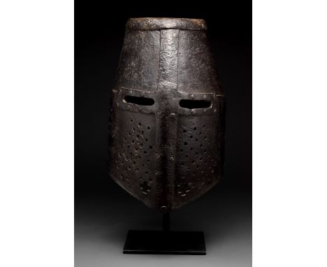 Ca. 1300 AD The great helm is composed of five riveted sheets of iron, four of which stand upright and are covered with an ov