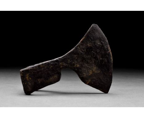 Ca. 900-1000 ADAn iron battle axe with a wide, fan-shaped blade, tapering cheek, heavy poll and a socket. For more informatio