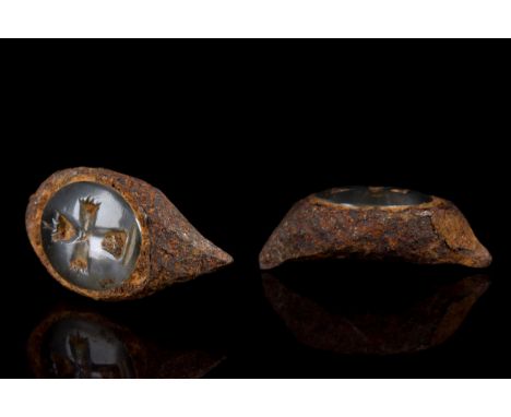 Ca. 500-700 ADEarly Christian Byzantine oval-shaped intaglio engraved within a stylised cross seated upon an altar. The gemst