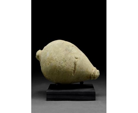 Ca. 800-1000 ADA ceramic grenade, also referred to as "Greek Fire". This hollow ceramic vessel features a piriform body with 
