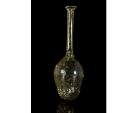 Ca. 1-200 ADA beautiful glass flask comprised of a flat-bottomed, bulbous body and tall cylindrical neck finished with folded